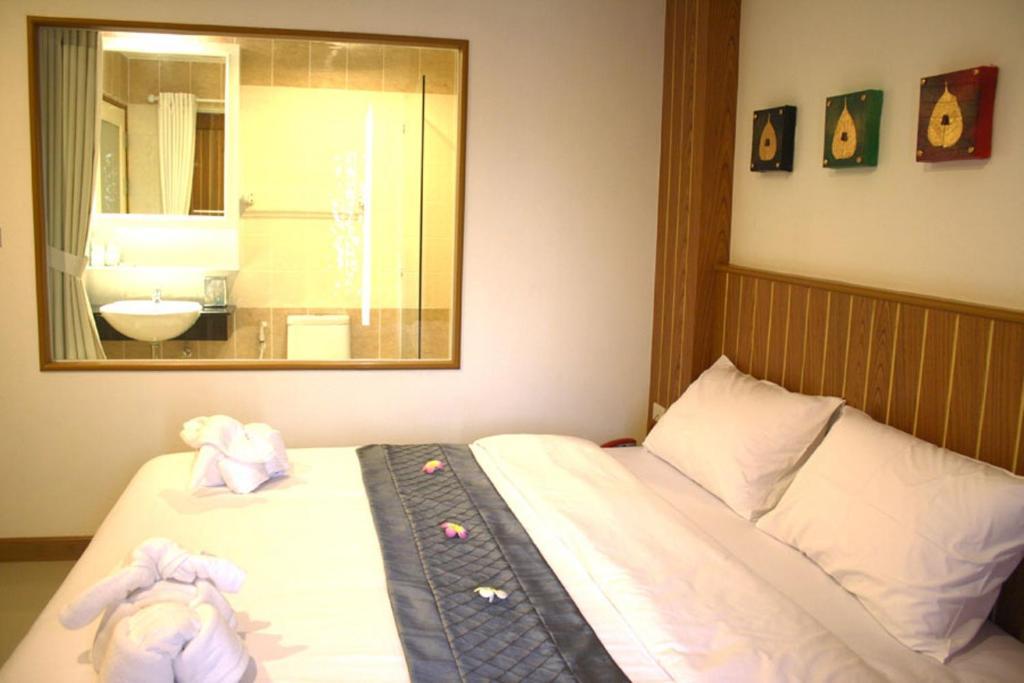 Santi White Hotel Phuket Quarto foto